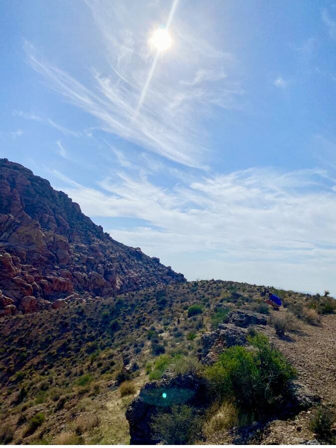 Desert sun over mountains